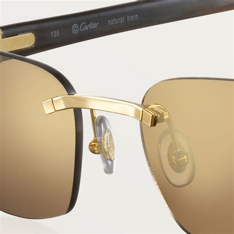 sunglasses with elongated c de cartier motif